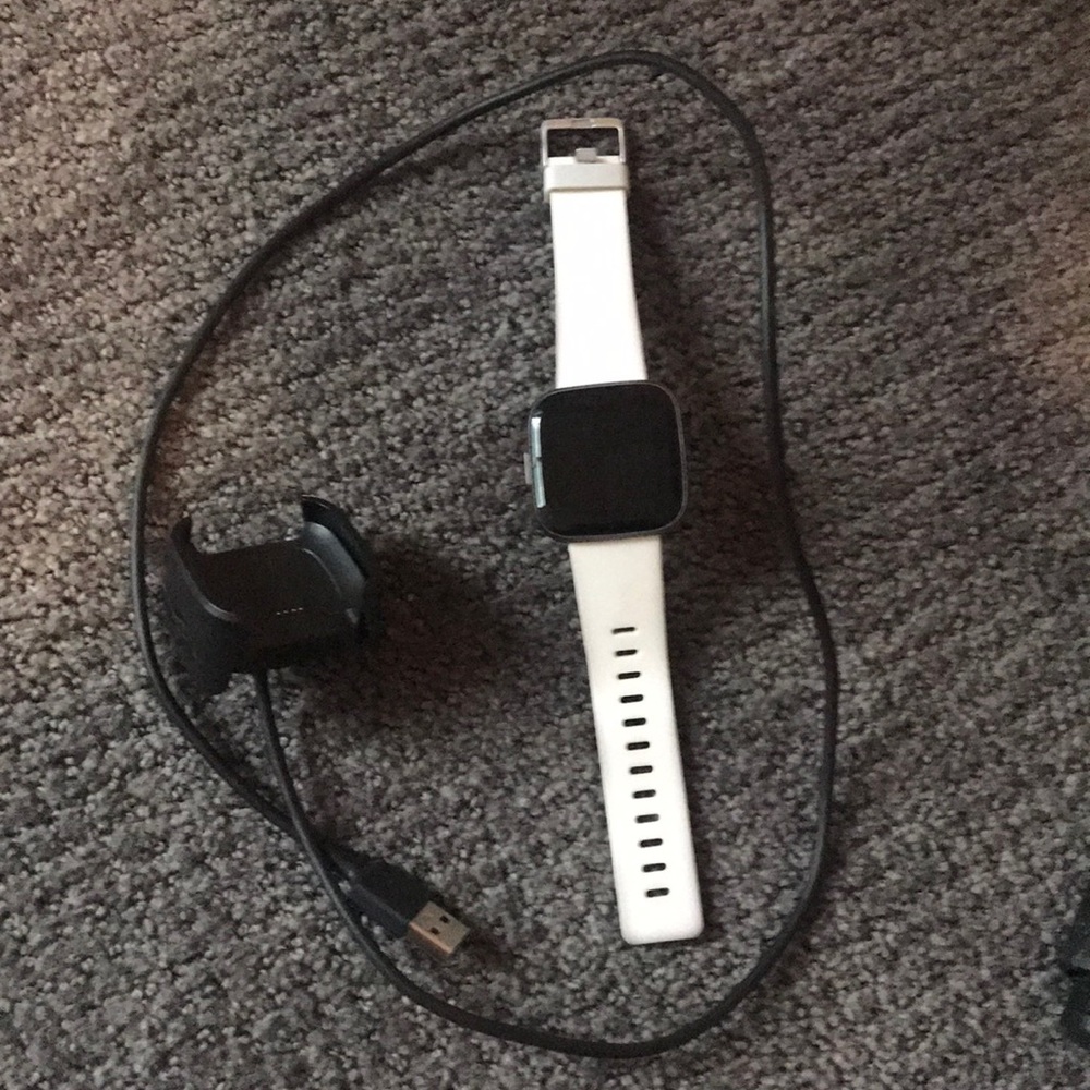 fitbit versa 2 with white band and grey band